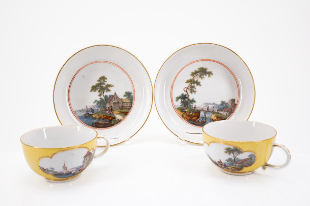 Four large plates and a bowl with leaping stag